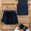 falda pantalon tachuelas top canale tachuelas
