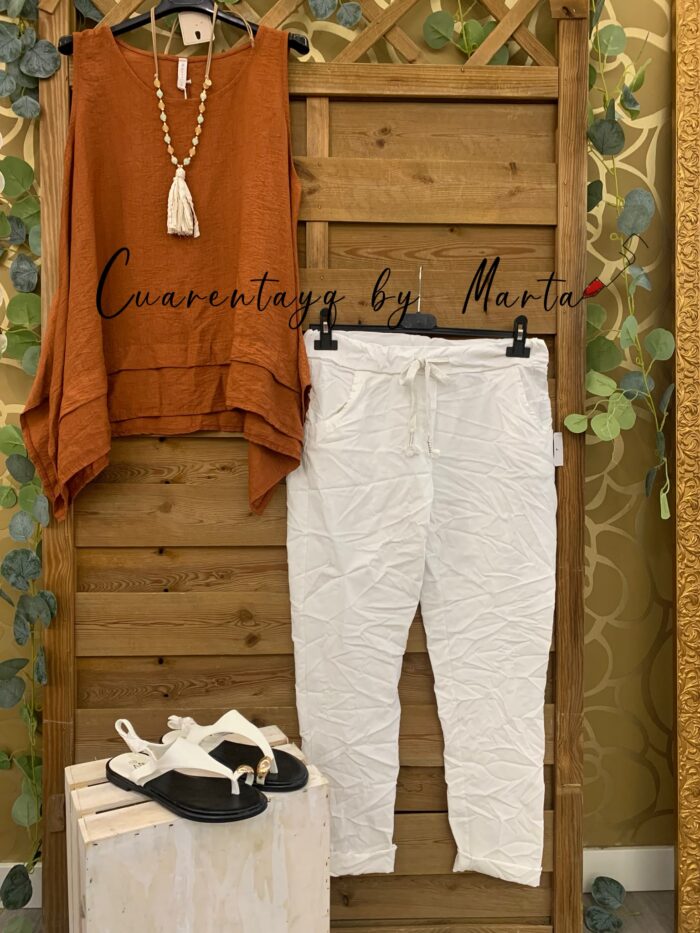 top corte asimetrico baggy liso