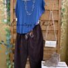 Blusa básica. pantalón balloon y pañuelo, botin city camel