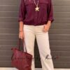 Blusa tenzel, pantalón bloguera en acción beige