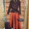 falda glamour, blusa gasa topos